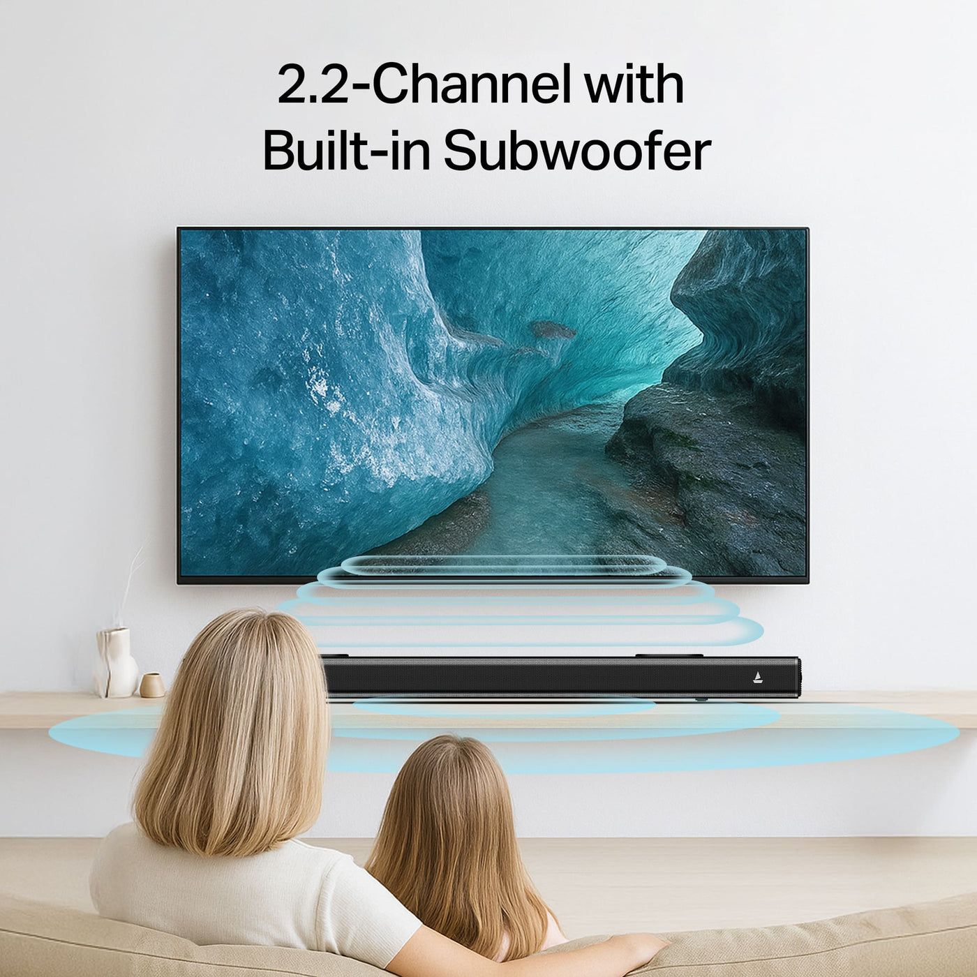 Mother and daughter watch TV with a 2.2 channel soundbar and built-in subwoofer in living room