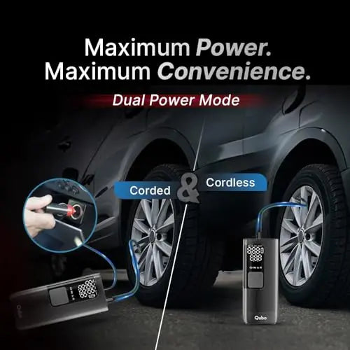 Qubo dual power portable tire inflator, corded and cordless, in use on car next to wheel