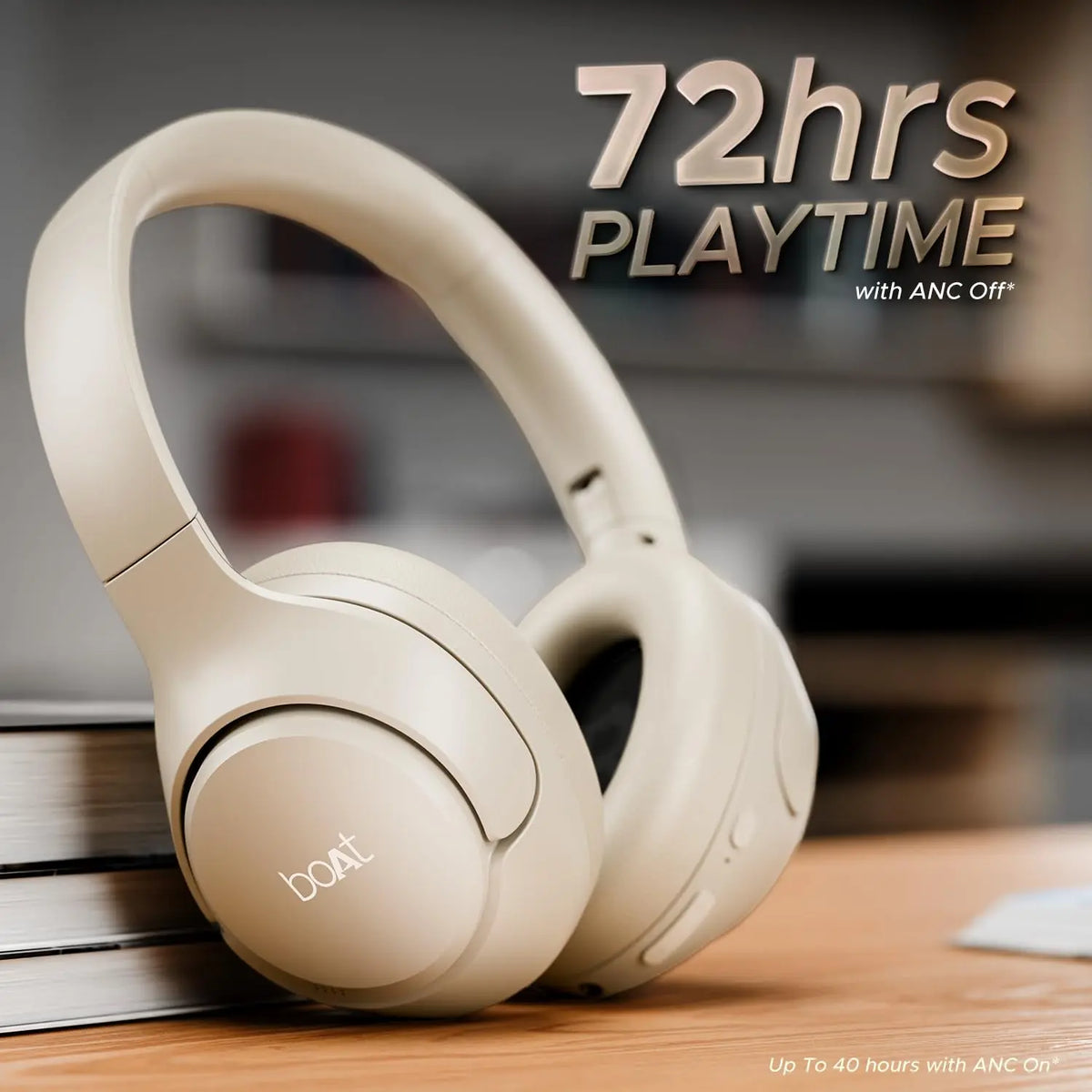 Boat beige wireless headphones with 72hrs playtime, displayed on a desk, Nalanda Enterprises