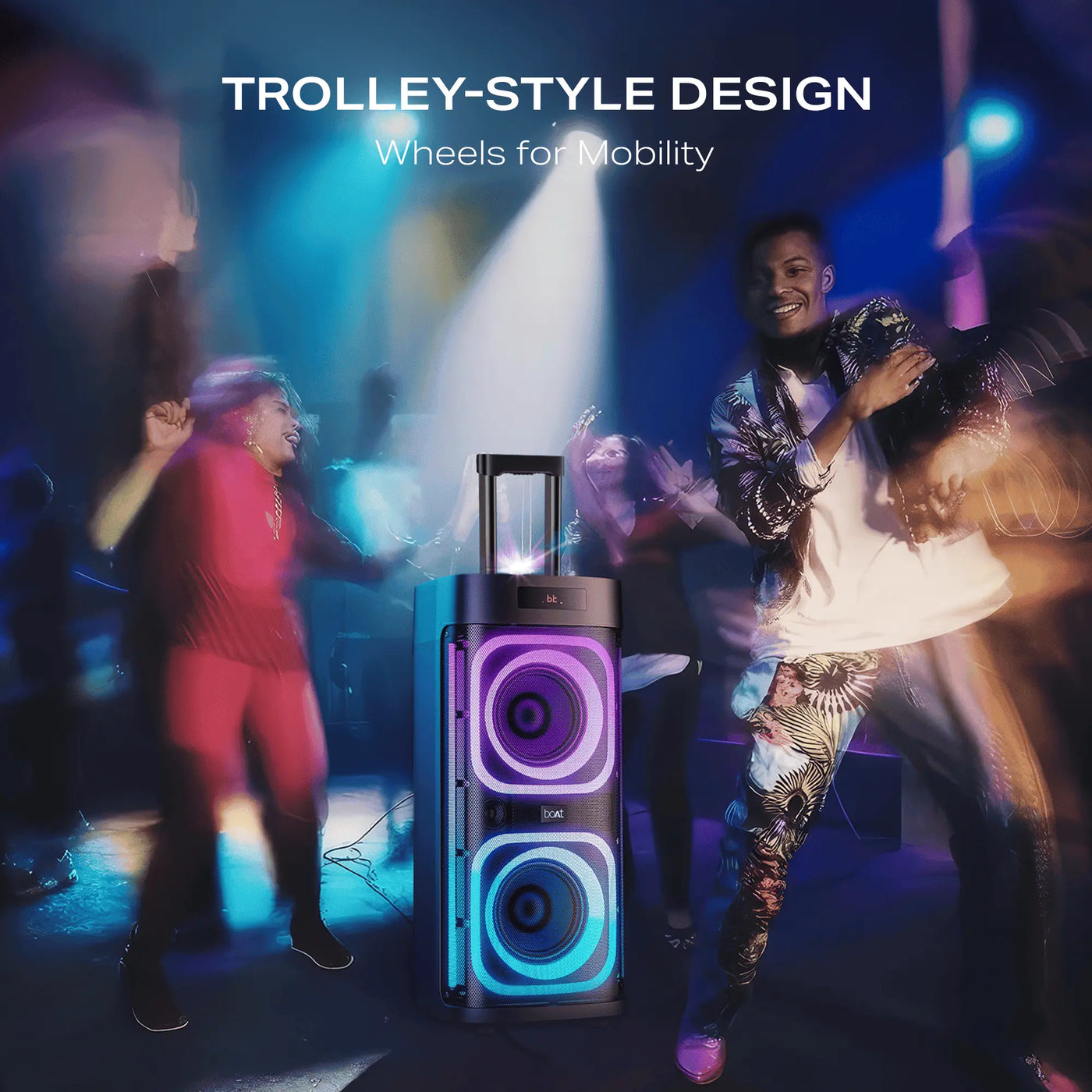 Party scene with people dancing around a Boat trolley-style portable speaker with LED lights, sold by Nalanda Enterprises.