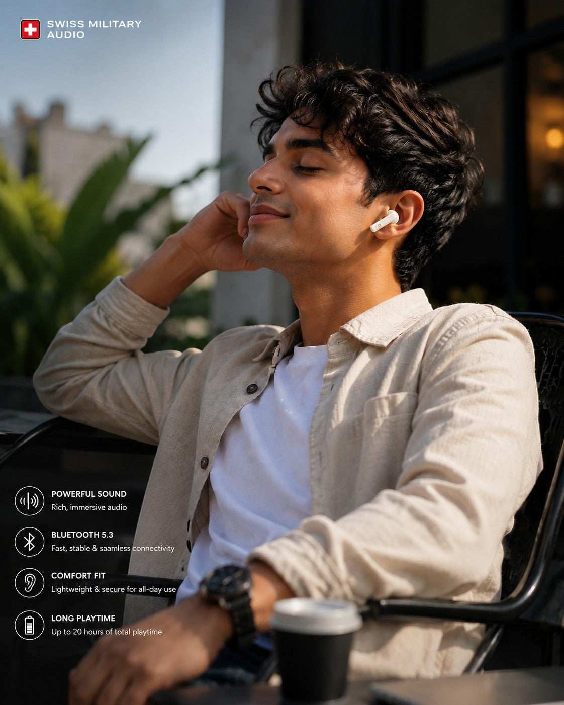 Swiss Military Audio white wireless earbuds with touch and voice control, worn by a man enjoying music outdoors.